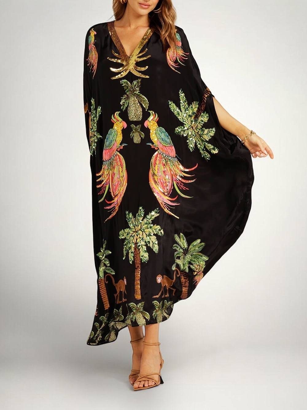 Løs dame-kjole med kokospalmeprint og drop shoulder