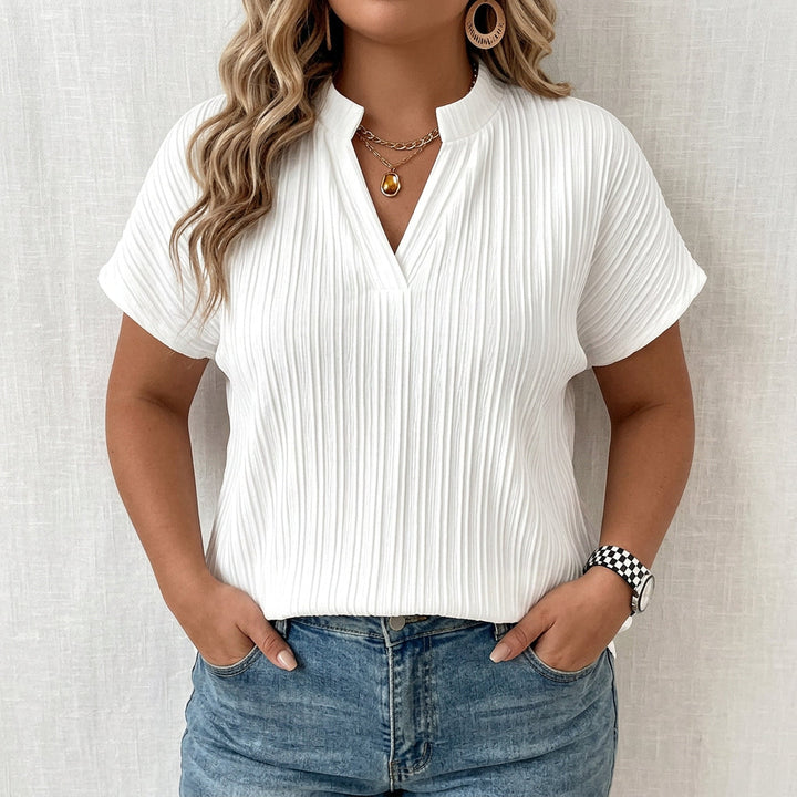 Casual blouse with a V-neck, short sleeves, and a pleated texture for women