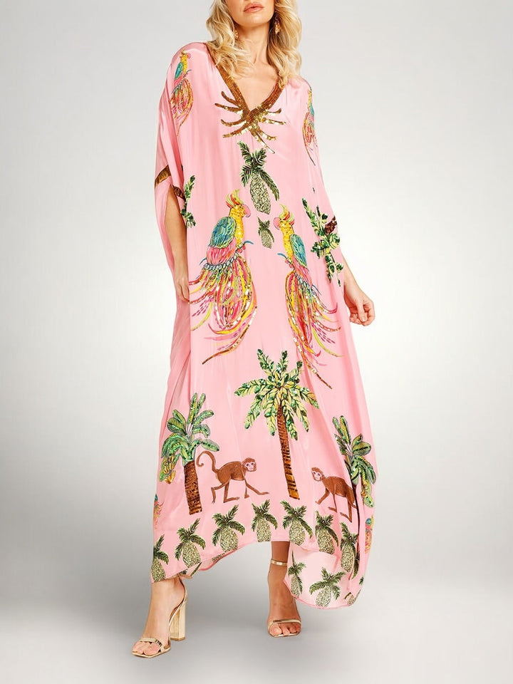 Løs dame-kjole med kokospalmeprint og drop shoulder