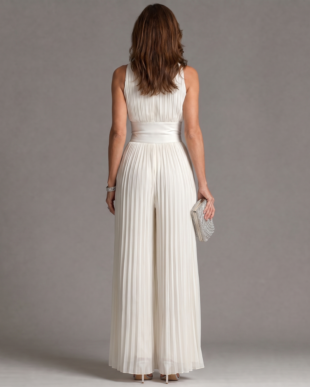 Sleeveless jumpsuit with halter neck and wide legs for women