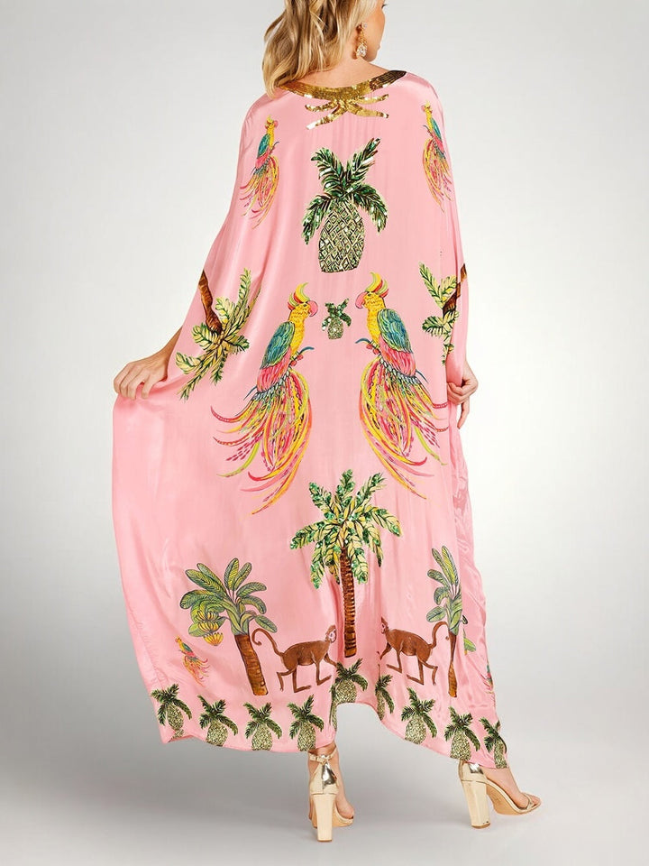 Løs dame-kjole med kokospalmeprint og drop shoulder