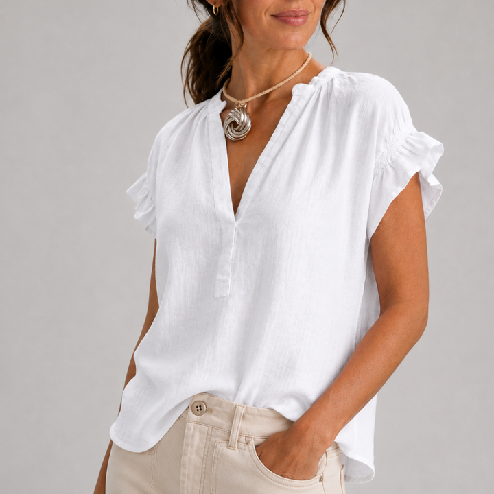 Relaxed linen blouse with a V-neckline and ruffled sleeves for women