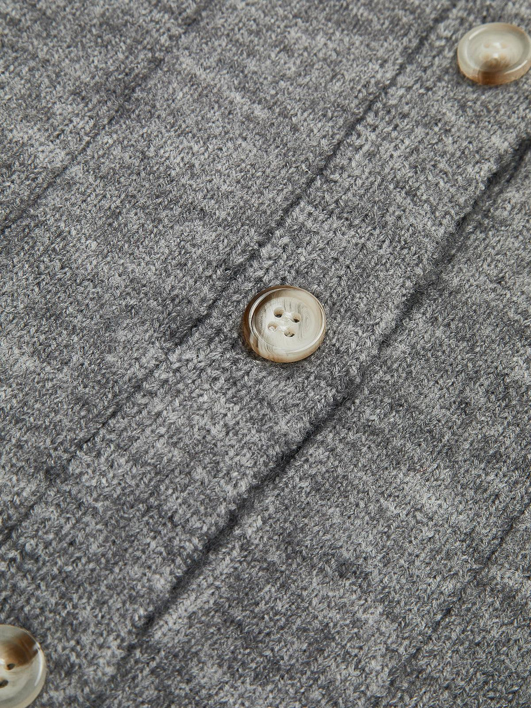 Soft cardigan with a round neckline and button closure for women