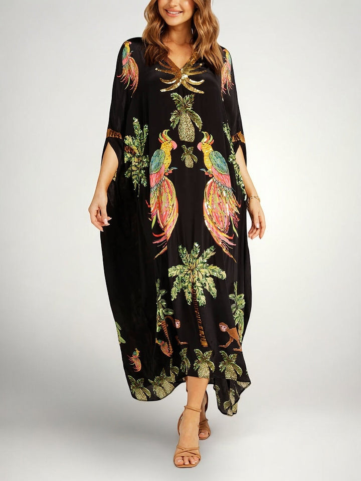 Løs dame-kjole med kokospalmeprint og drop shoulder