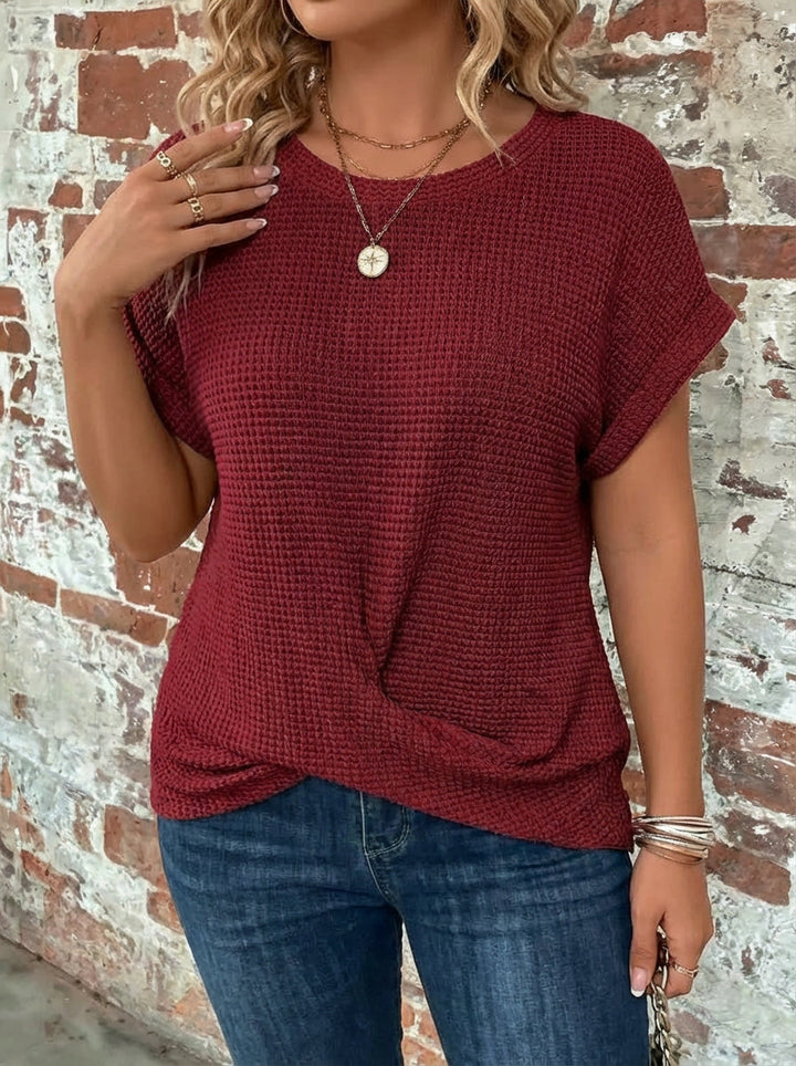 Waffle-knit T-shirt with rolled sleeves and twisted detail for women