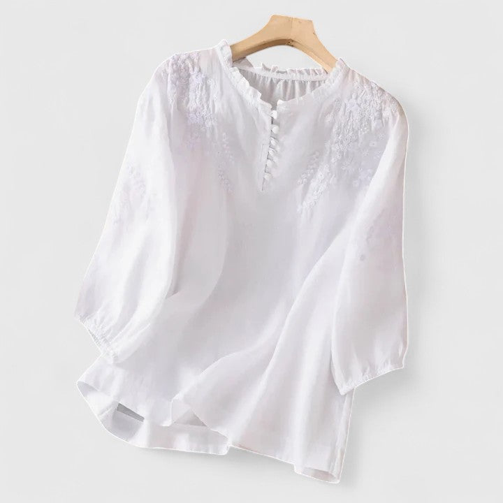 Women's blouse with front button closure