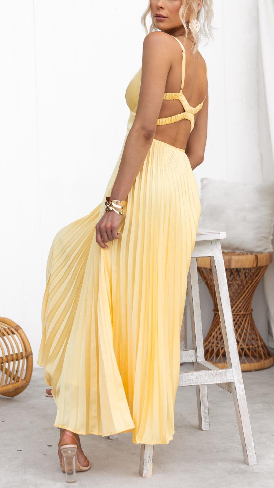 Yellow pleated maxi dress with V-neck for women