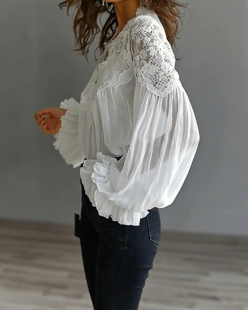 Dame-bluse i blomstret blonde med lanterneærmer