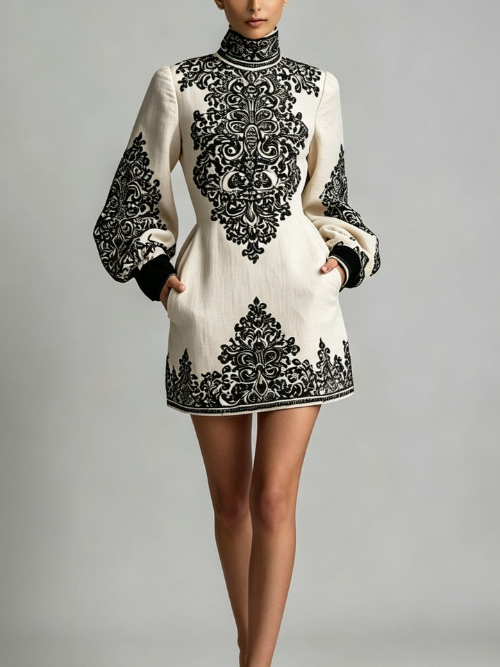Women's mini dress with ornate pattern, high neckline and long sleeves