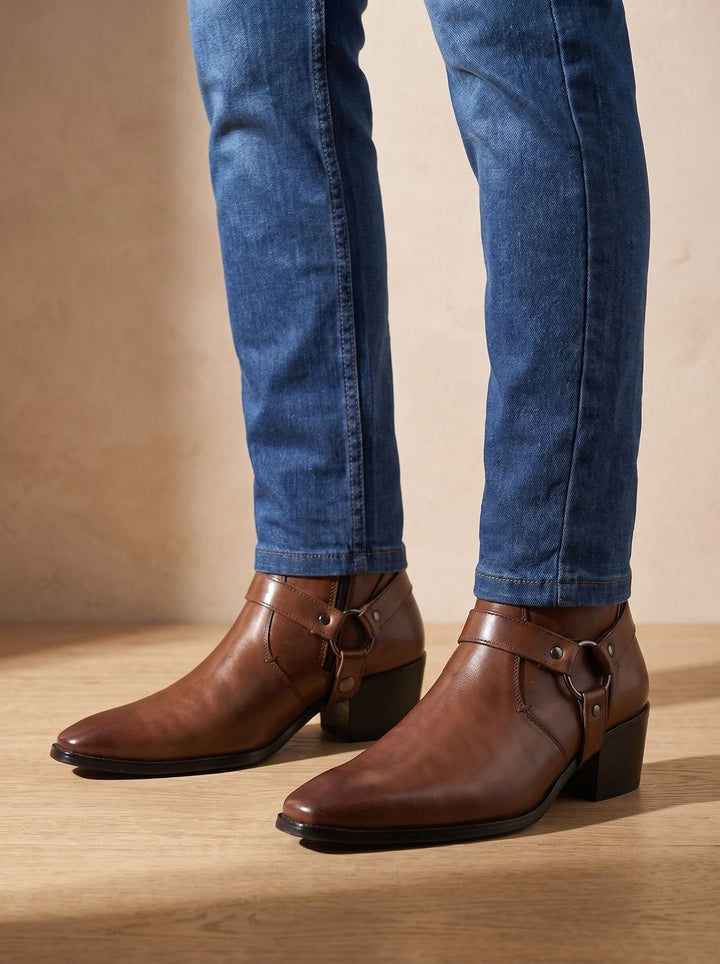 Leather boots with a strap and pointed toe for men