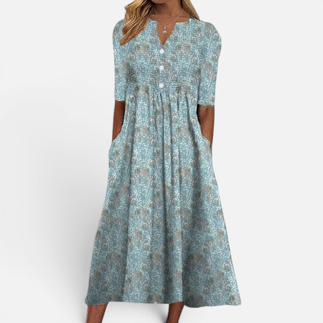 Blomstret midikjole med knapper til kvinder