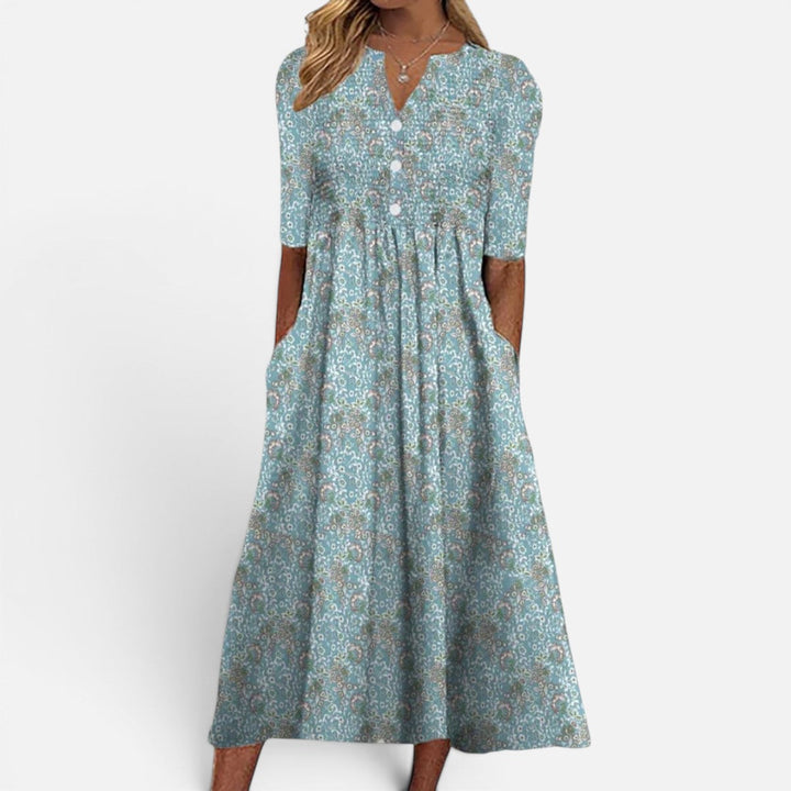 Blomstret midikjole med knapper til kvinder
