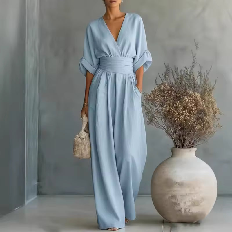 Elegant women's jumpsuit with a deep V-neckline and wide legs