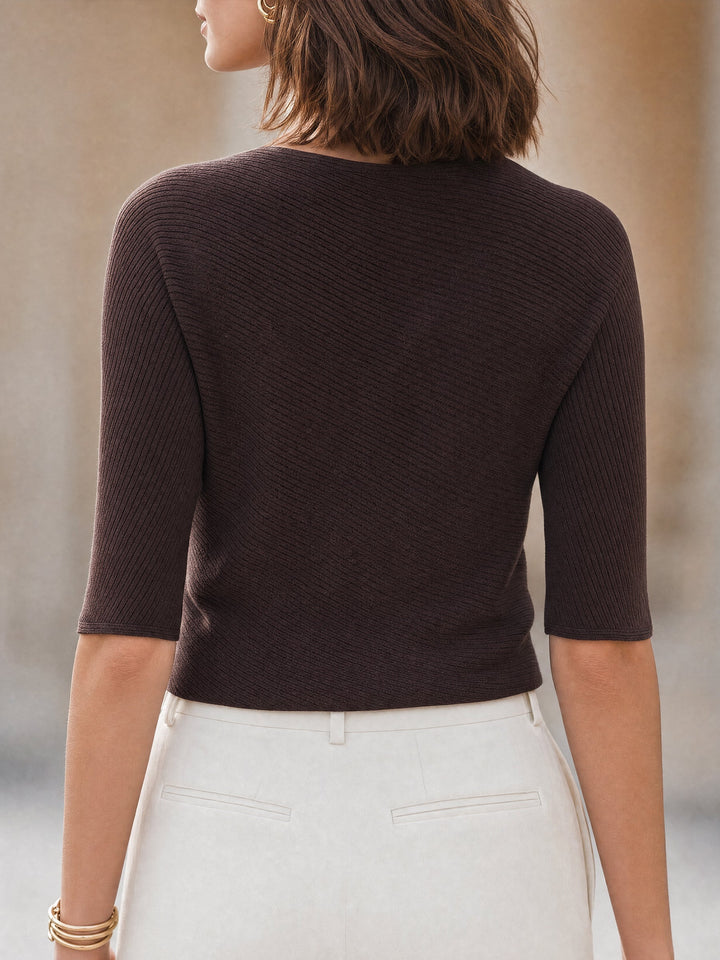 Ribbed knit top with an asymmetrical button closure for women